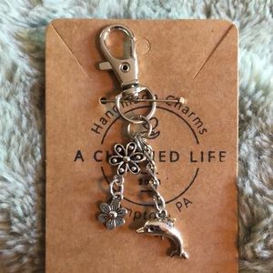 NWT, Handcrafted by A Charmed Life. Silver Luggage Zipper Pull